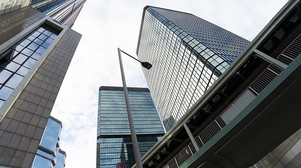 Looking up at tall office buildings