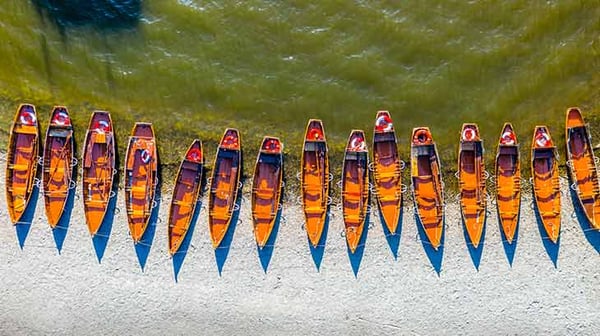 Aerial view of row of boats
