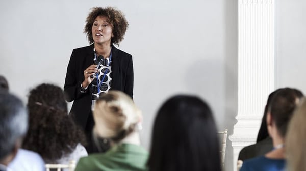 Woman speaking at an event
