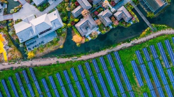 Aerial view of solar farm and other buildings